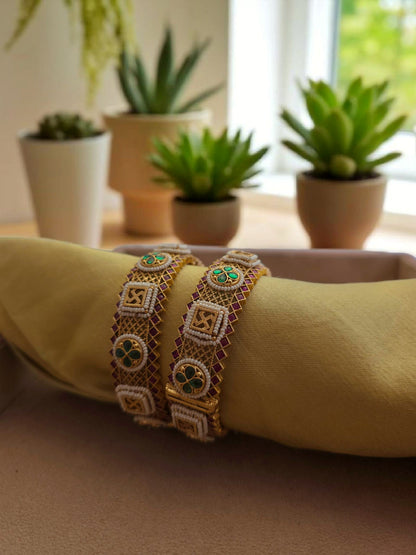 Swastik & Floral Traditional Kundan Bangles – Ruby & Green Detailing